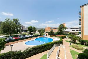 an overhead view of a swimming pool in a parking lot at Calma Mar in Los Mártires