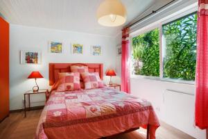 a bedroom with a bed and a large window at Casa do Campo Dornes Um in Paio Mendes +23 photos
