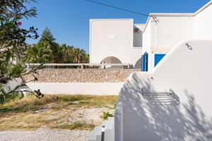 a view of the villa from the yard at Aegean Blue Santorini Perissa in Perissa