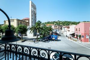 a view of a city street from a balcony at Casa Damiano 1935 in Villasimius