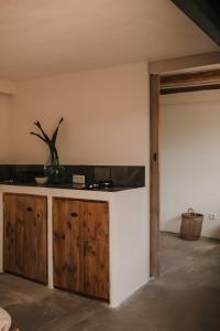 a room with a kitchen with a counter top at Sa caseta mallorca Studio in Algaida