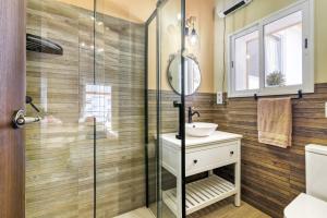 a bathroom with a sink and a shower at Tío Salvador in Bolbaite +22 photos