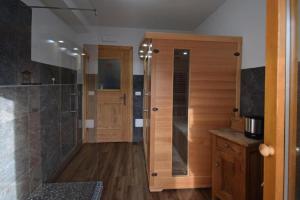 a bathroom with a shower and a walk in shower at Affittacamere da Annarè in Comèlico Superiore