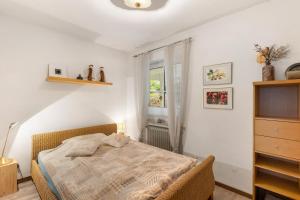 a bedroom with a bed and a window at Auf Der Stadtmauer in Schmallenberg