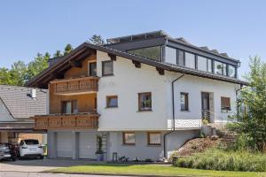 a large white house with a lot of windows at Ferienwohnung Böhler in Doren