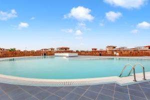 a large swimming pool on top of a building at Villa Manuela in Lajares