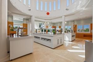 a salon with white counters and a large ceiling at Villa Ole Bahiazul-Private Jacuzzi in Corralejo +30 photos
