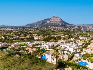 an aerial view of a suburb with a mountain in the background at Villa Del Sol - Solo Familias 1819 in Jávea