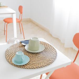 a table with a hat and two cups on it at Villa Vetrano in Cimitile