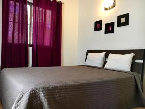 Postel nebo postele na pokoji v ubytování Coral Blanco Hotel