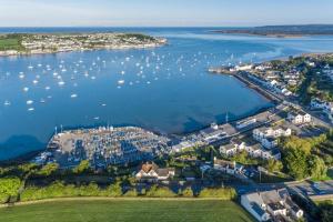 an aerial view of a harbor with boats in the water at 2 Bed in Appledore oc-cosyn in Appledore
