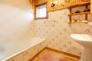 a bathroom with a sink and a toilet at Le Col Panoramic in La Toussuire +13 photos
