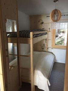 Postel nebo postele na pokoji v ubytování Verbier Medran apartment