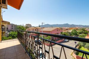 a balcony with a view of a city at Il Faro in Sarroch