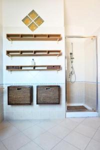 a bathroom with a shower with a glass shower stall at Luxury Guesthouse Pula in Pula +18 photos