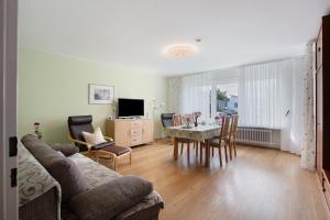 a living room with a couch and a table at Ferienwohnung Barbara in Karsau