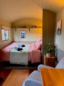a bedroom with a bed in a room at Clachamish House in Portree