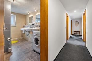 a laundry room with a washer and dryer at Bad day good day in Horn-Bad Meinberg