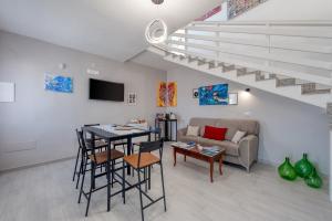 a living room with a couch and a table at Meravigliosalento in Squinzano