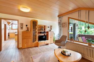a living room with a couch and a table at Haus Seiler in Freudenstadt