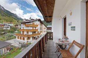 a balcony with a view of a building at Casa de Lorenzo in Vodo Cadore