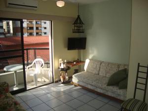 Zona de estar de Aconchegante Apto 02 Quartos - Rua 906 - Balneário Camboriú