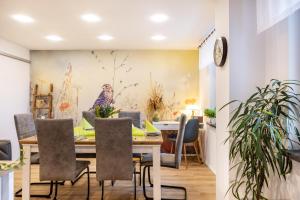 a dining room with a table and chairs at Ferienhaus Kirsch in Blankenhain