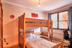 a bedroom with two bunk beds and a desk at Villa De Marchi in Saint-Just-de-Claix +10 photos