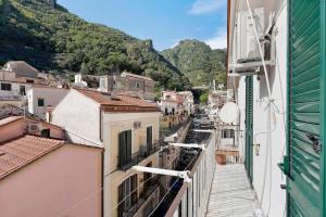 a view of a city with buildings and mountains at Ce Tour - Nonni's Lemon House in Cetara