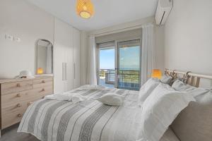 Llit o llits en una habitació de Villa Elia