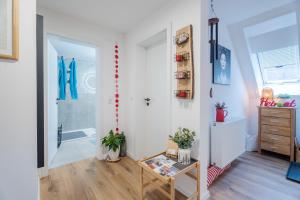 a room with a bathroom with a walk in shower at Onkel Franz in Ohlsbach +37 photos