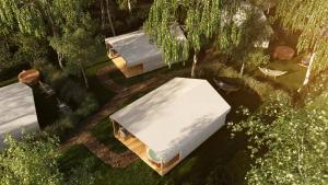 an overhead view of a white tent in a garden at Eco Camping in Spytkowice
