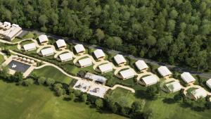 an overhead view of a group of houses and trees at Eco Camping in Spytkowice