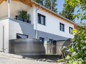 an external view of a house at Ländle Lodge bei Bregenz in Langen bei Bregenz