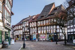 a group of buildings on a city street at Apartment auf dem Land in Einbeck