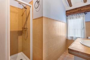a bathroom with a shower and a sink at Romero in Hinojares +26 photos