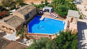 an overhead view of a swimming pool at a resort at Casa s’Hort - Can Rita in Llombarts