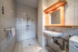 a bathroom with a sink and a shower at L' Abbaye in Abondance +96 photos