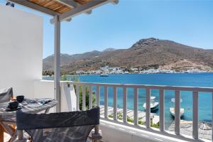 a balcony with a view of the water at Nicolas House 4 in Rakhídhion