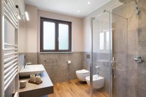 a bathroom with a shower and a toilet and a sink at Agriturismo il Borgo - Lavanda in Villanova dʼAlbenga +31 photos