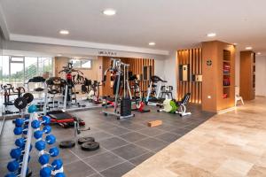 a gym with several treadmills and exercise equipment at Lavender Residence in Kuşadası +148 photos