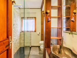a bathroom with a sink and a toilet at Apartment Chalet Altavista by Interhome in Ziano di Fiemme