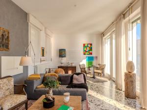 a living room with a couch and a table at Villa Casa Silvana by Interhome in Valsolda