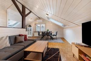 a living room with a couch and a table at Ferienwohnung Witt in Salem