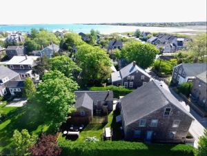 an aerial view of a residential neighborhood with houses at Downtown Historic Nantucket Cottage in Nantucket