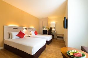 Llit o llits en una habitació de Hotel Sentral Georgetown @ City Centre
