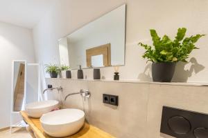 a bathroom with a white toilet and a mirror at Fewo beim Nik mit Wanderreitstation in Höslwang +11 photos