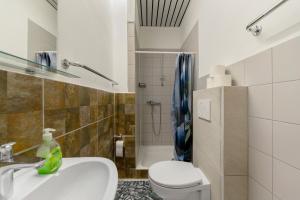 a bathroom with a toilet and a sink at 2 Bett Apartment a d A8 - W5 in Beckingen
