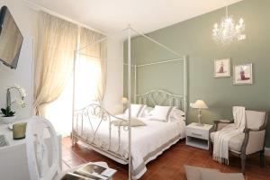 Un pat sau paturi într-o cameră la Casa Ponte Sisto Guesthouse
