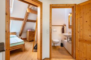 a bathroom with a toilet and a sink at Hof Wegwarte in Weilheim +44 photos